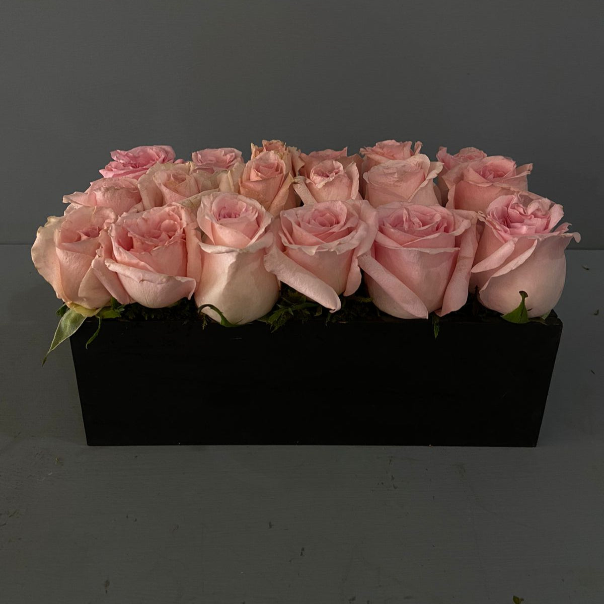 Caja 18 rosas rosas o rojas